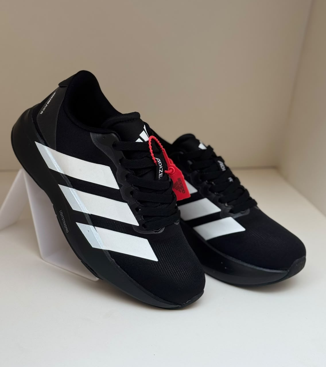 New Adizero Black with White Straps